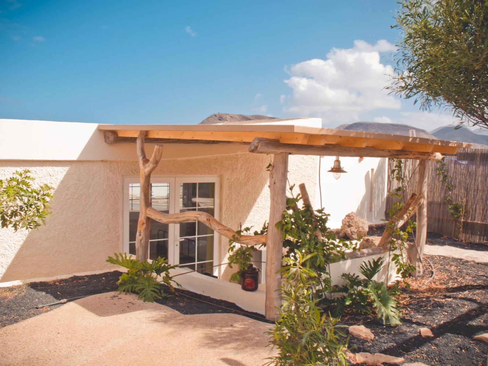 Hotel Gartenappertement - Tierra - Surf & Yoga Villa