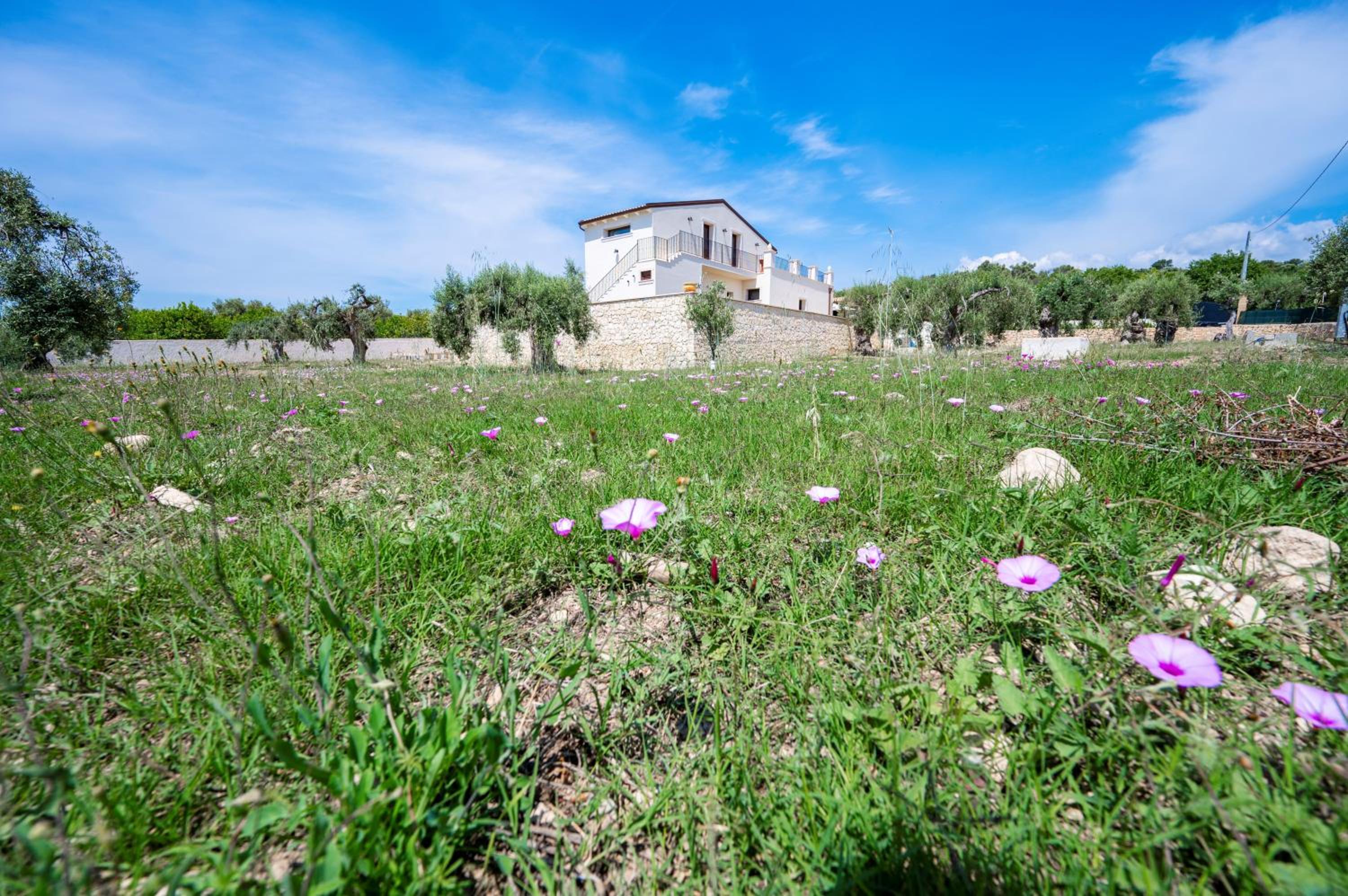 Hotel Villa CarmIano luxury bedrooms in Avola in the province of Syracuse with spa and swimming pool and wonderful seaview